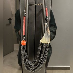 Asymmetrical beaded horn necklace from Senegal